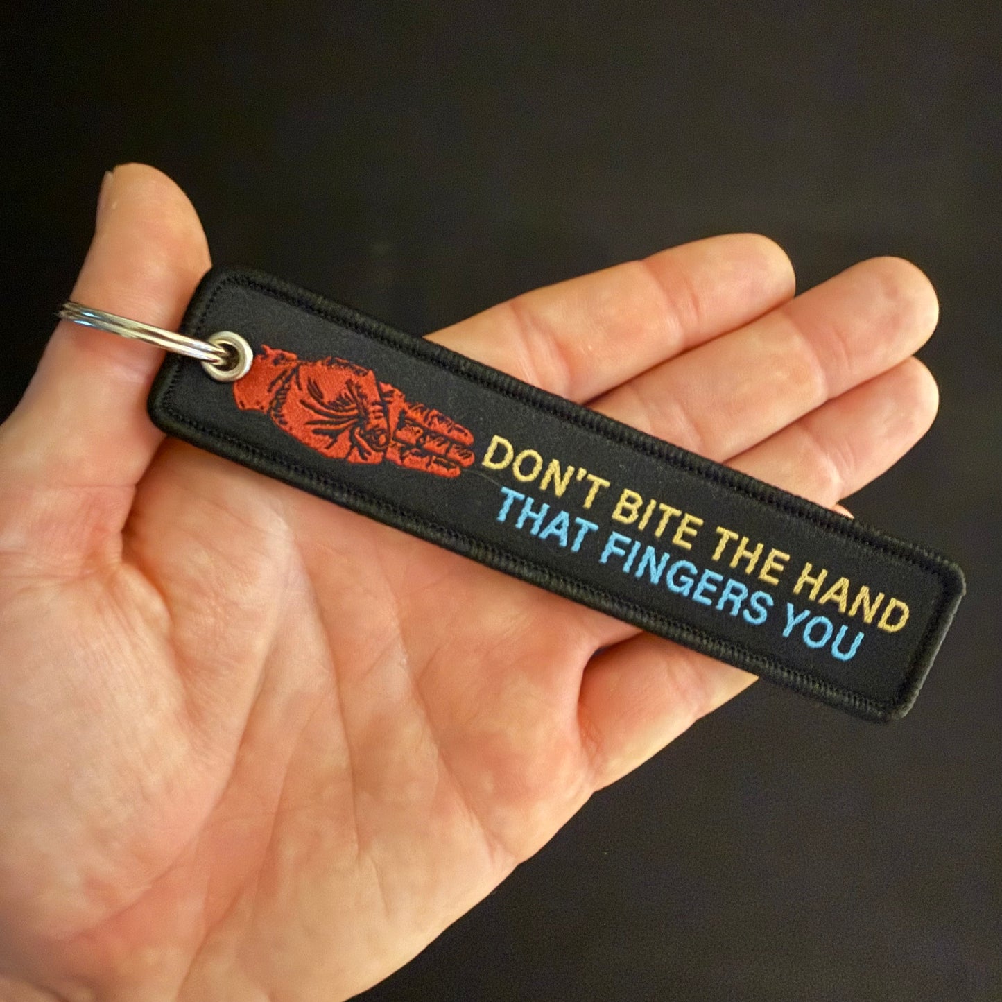 DONT BITE THE HAND JET TAG
