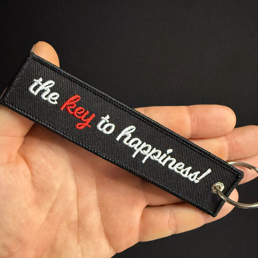 THE KEY TO HAPPINESS JET TAG