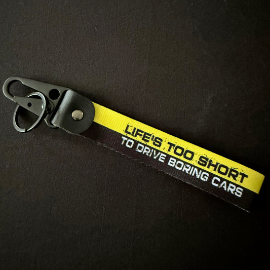 LIFE IS TO SHORT WRIST STRAP KEYCHAIN
